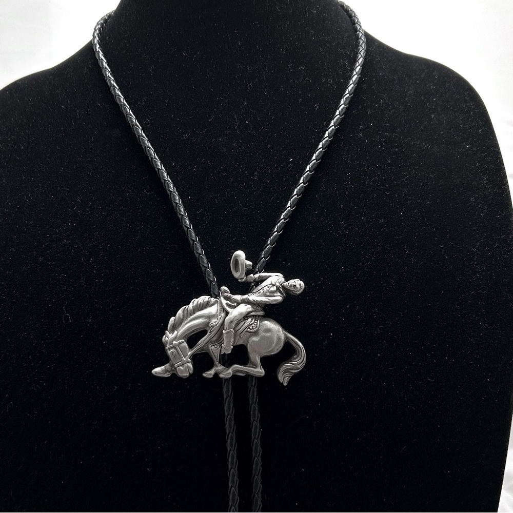 Gold Crown Inc., Vintage, Silver Black Braided Leather Bucking Bronco Bolo Tie